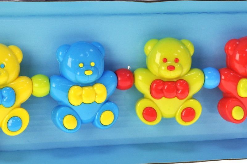 Брязкальце на візок C301-2 "Ведмедики" в коробці р.32,8x11x4,8 см YG Toys Нем3156 фото